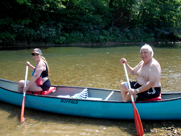 the two RV Gypsies in a canoe 