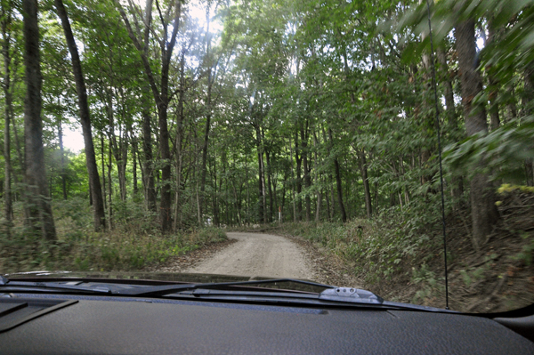 a two-way dirt road that is very  narrow