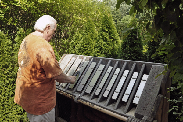 Lee Duquette plays the different musical instruments in the Music Maze area.