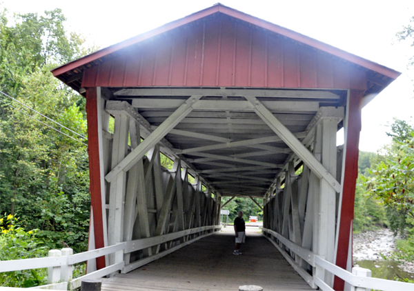 Lee Duquette inside Everett Road Covered Bridge