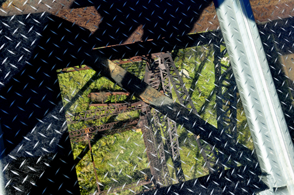 Looking through the glass floor of the Kinzua bridge to 301 feet down