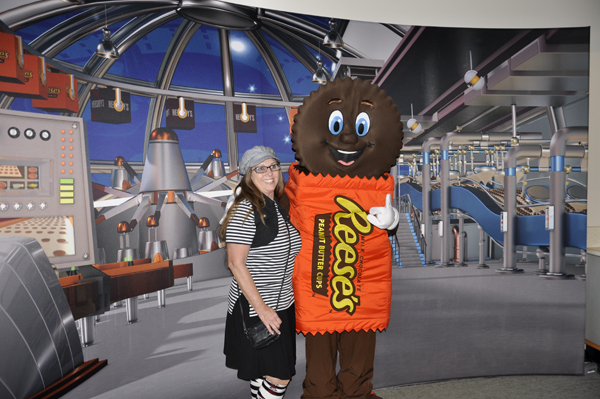 Karen Duquette and a walking Reese's Peanut Butter Cup