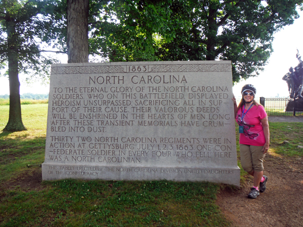 Karen Duquette and an NC plaque