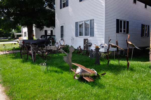 art in the yard of a house