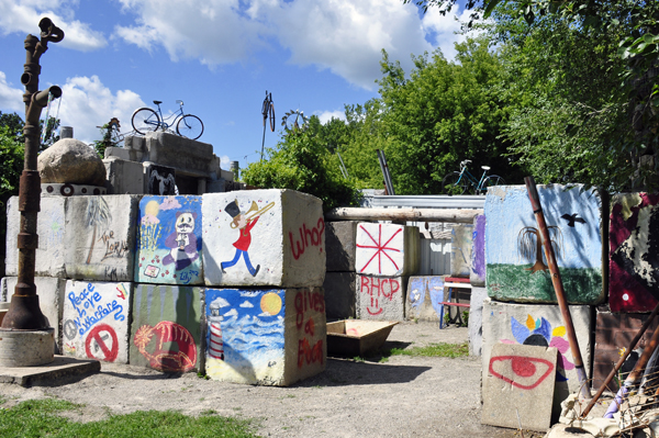 big blocks of cement and bicycles