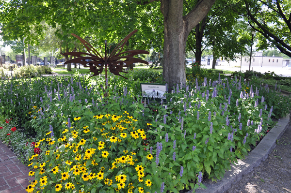 butterfly sculpture in the flower garden