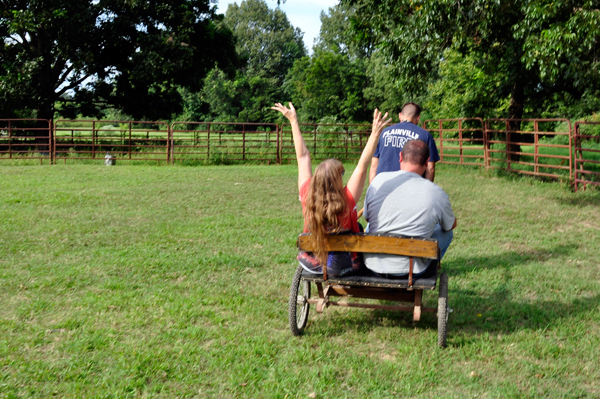 Karen Duquette on a pony cart ride