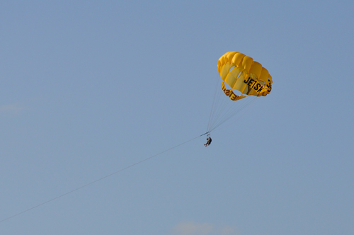 3 people on a parasail