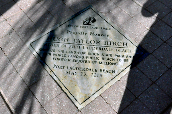 plaque on sidewalk