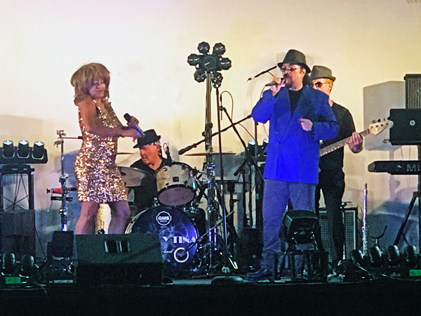 Tina Turner impersonator and band