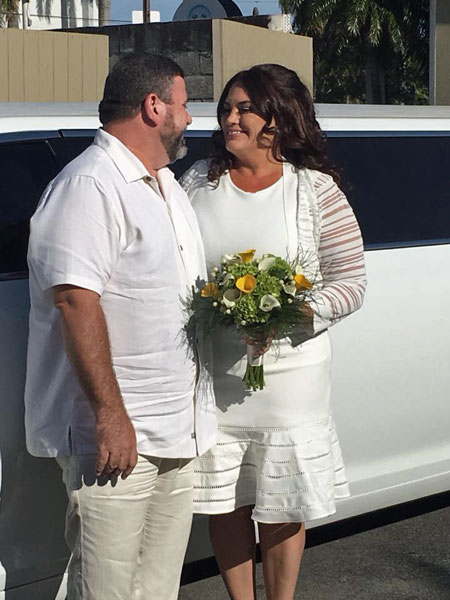 John and Renee exit the limo