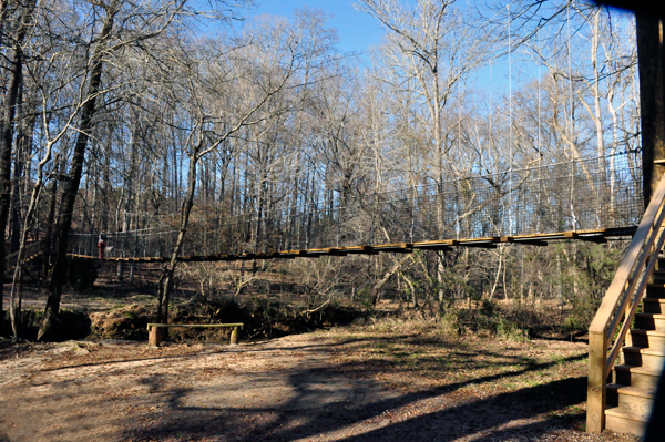 swinging bridge at Anne Springs Greenway