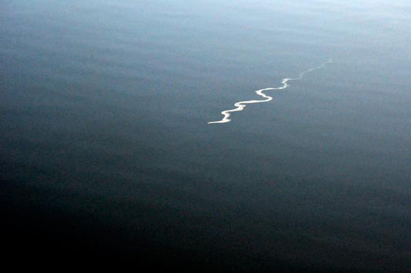 jagged reflection in the lake.