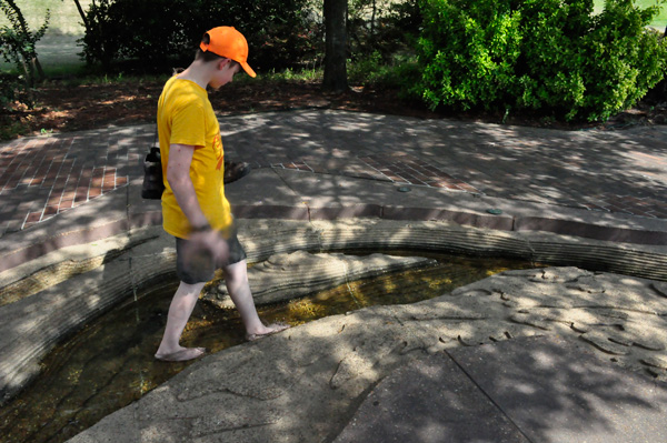 Seth walking in the Mississippi River