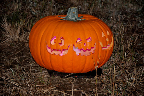 3 faces on a pumpkin