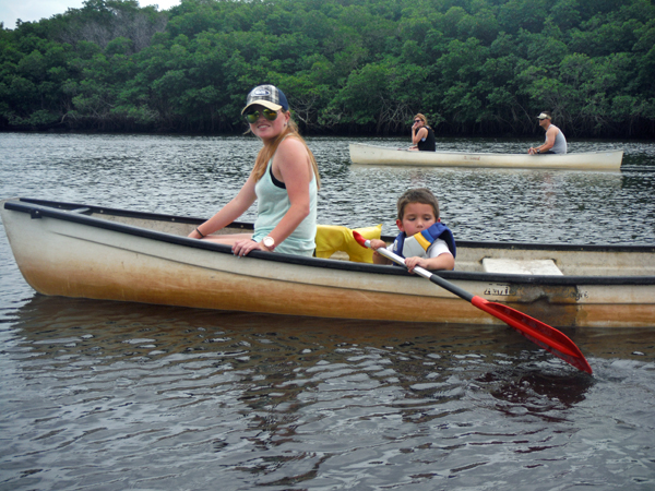 Anthony gets to paddle the canoe.