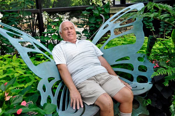 Lee Duquette relaxes in a butterlfy chair
