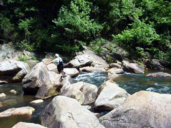 Lee Duquette crossing the big boulders