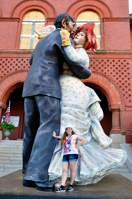 Karen Duquette and a big statue