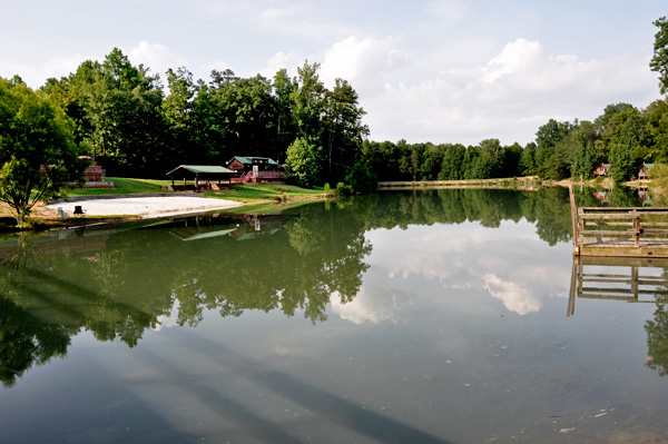 The sand beach, pond and fishing pier