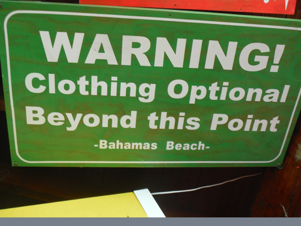 clothing optional sign at Senor Frog's