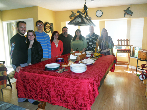 family around the buffet table