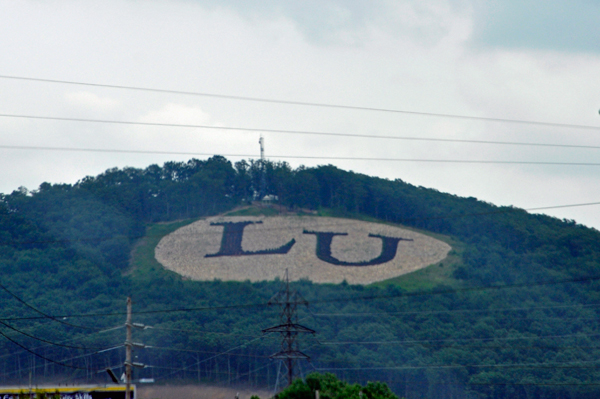 initials LU on the mountain