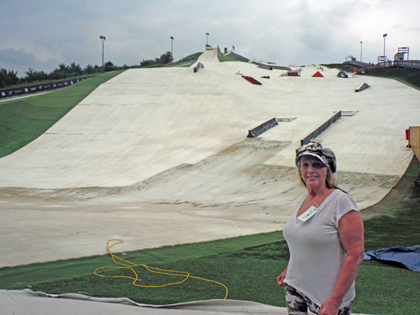 Karen Duquette in front of the snow boarding area