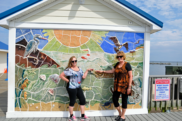 Karen and Barbara pet the sea otter