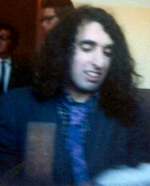 Tiny Tim signing autographs