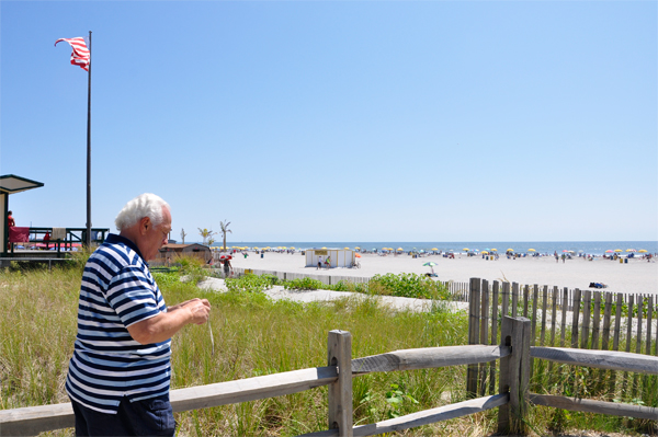 Lee Duqette on the twalkway to the beach