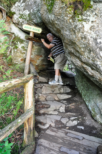 Lee ducks under the ARCH ROCK