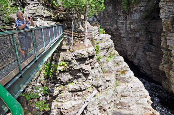 Lee Duquette on a bridge at Ausable Chasm