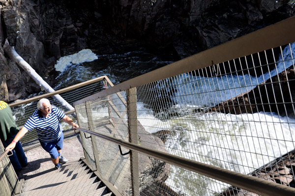 Lee descends the steep set of stairs