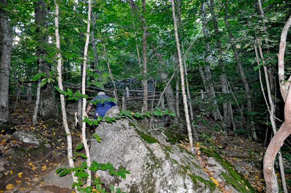 Lee Duquette going up stone stairs