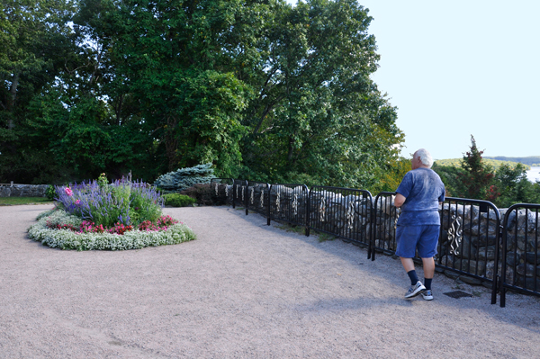 Lee Duquette and floweres behind Gillette's Castle