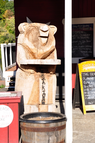 a carving on the porch of the Pizza King Restaurat