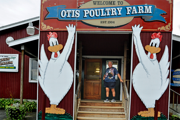 Lee Duquette and two big chickens