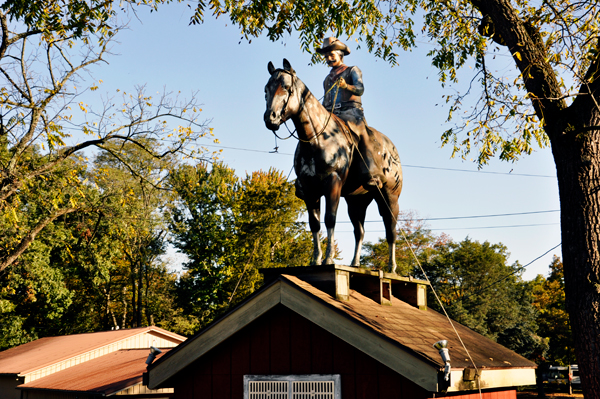 rider and horse on a building