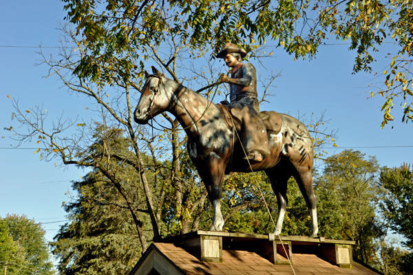 rider and horse on a building