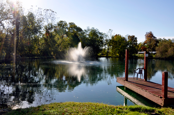 A nice pond and water fountain in the campground