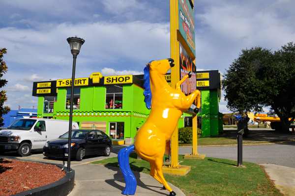 yellow horse with blue tail and mane