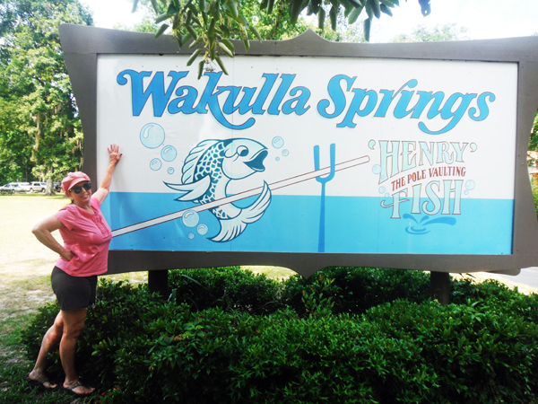 Karen Duquette at the Wakulla Springs sign