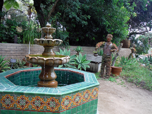 water fountain and topiary