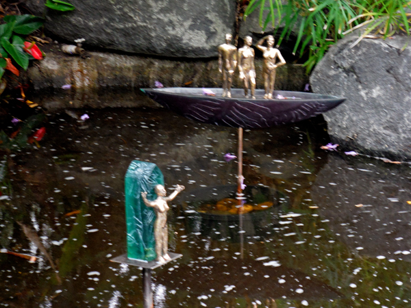 figurines in the rainforest