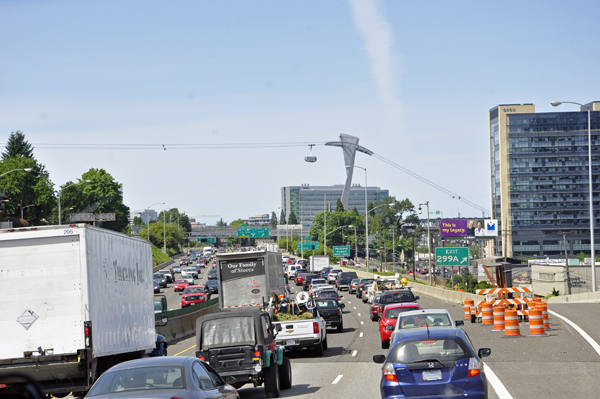 traffic and a sky tram in Portland