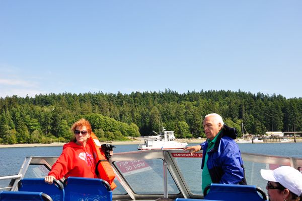 Ilse and Lee on the seated, open deck boat