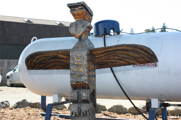 totem pole and propane tank