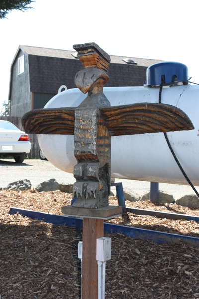 totem pole and propane tank