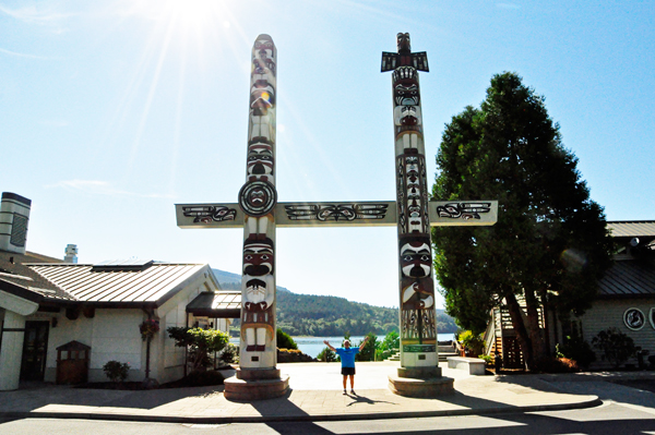 Lee Duquette by tall totem poles